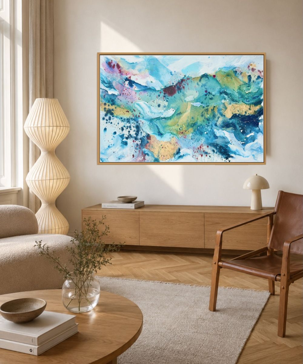 Large original abstract wall art on canvas, 100x150 cm, oak framed. Vibrant fluid brushwork in teal, warm gold, sky blue and dusty rose by Danish fine artist Mette Lindberg. Unique one-of-a-kind piece