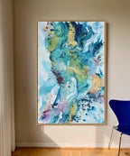 Soft #12 – large original painting on canvas, 100x150 cm, oak framed. Vibrant abstract layers in teal, blue, warm gold and dusty rose by Danish contemporary artist Mette Lindberg.