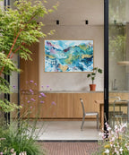 One-of-a-kind abstract wall art on canvas in natural oak frame. Rich fluid brushwork in teal, sky blue, gold and mauve by Danish fine artist Mette Lindberg. Original artwork, 100x150 cm