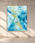 Large original abstract canvas art in flowing blue, teal and golden hues, oak framed. One-of-a-kind expressive painting by Danish contemporary artist Mette Lindberg