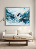Large blue abstract art poster above sofa – modern art print in nordic style