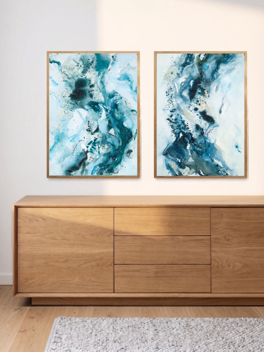 Soft #14 and companion abstract art prints in oak frames displayed above a wooden sideboard.